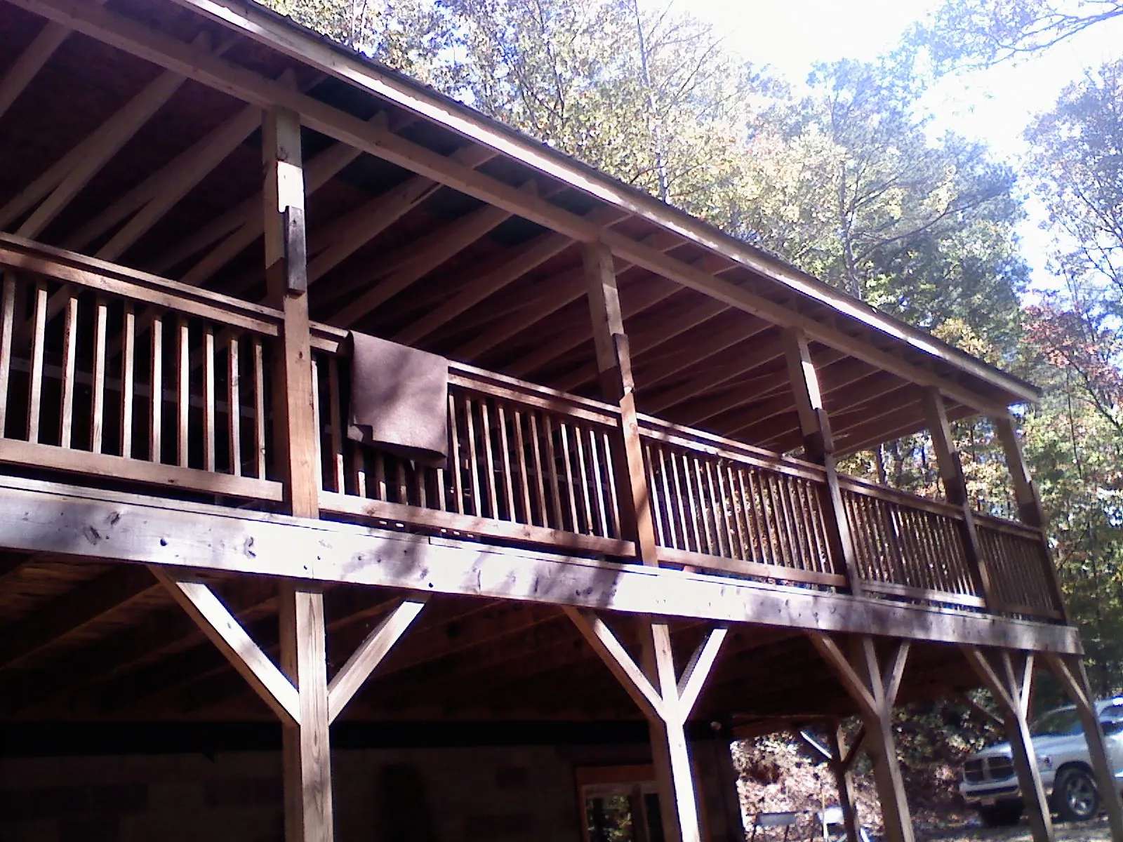 Timber framing under a new elevated porch and deck — Roof Leak Repair in Boykins by Roofing Brothers